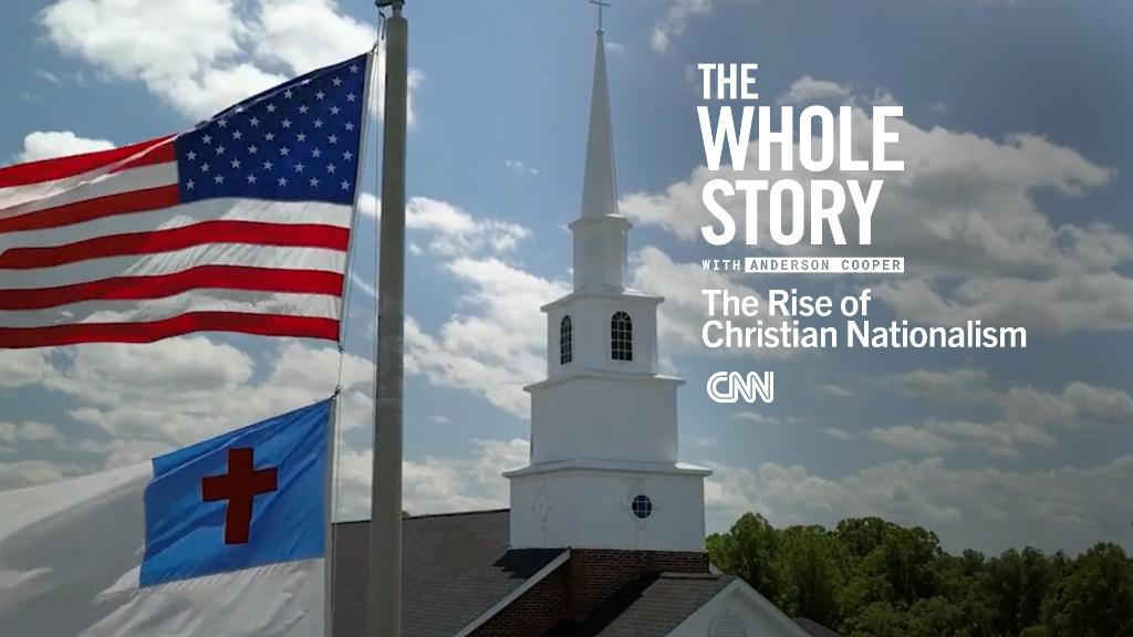 Promotional graphic for CNN’s The Whole Story with Anderson Cooper: The Rise of Christian Nationalism — church steeple, American flag and Christian flag, blue sky.